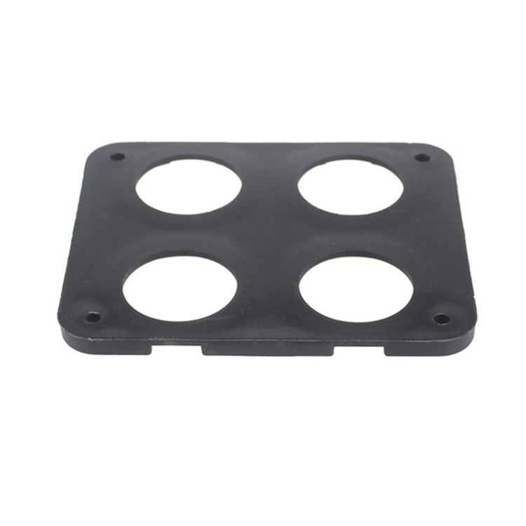 Black 4-hole car charging panel with four circular cutouts and side mounting holes