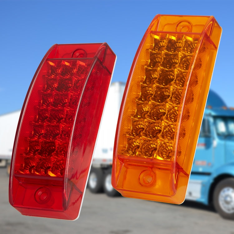 Pair of red and yellow LED tail lights with clear rectangular lenses