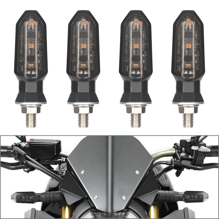 Black motorcycle LED turn signal light, clear lens with amber glow