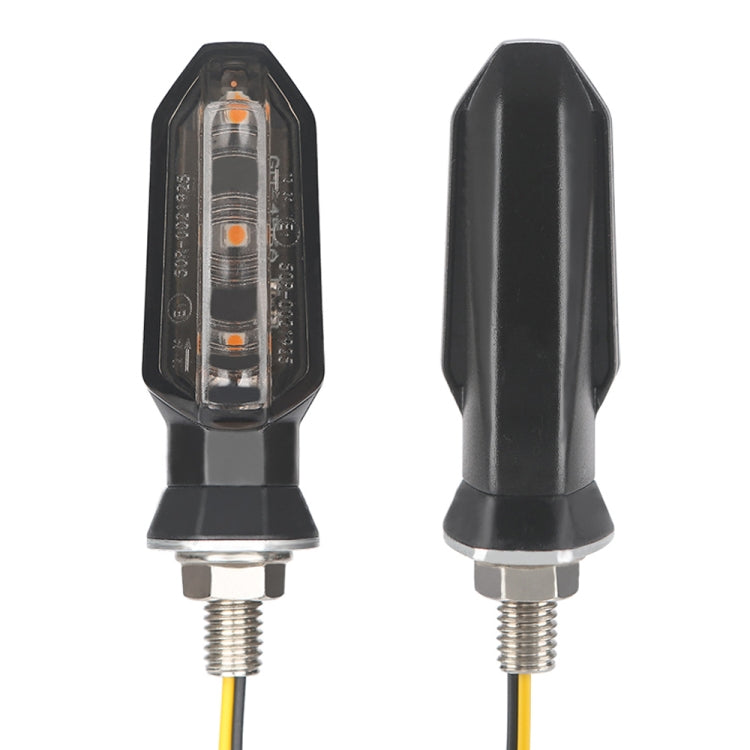 Black motorcycle LED turn signal light, front and rear view with clear amber lens