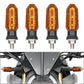 Amber motorcycle LED turn signal light set with orange glow in clear lenses