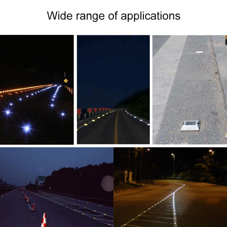 Solar road stud lights flashing along a roadway with bright white lane lines