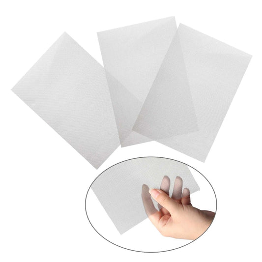 White crack repair mesh sheets with hand applying patch