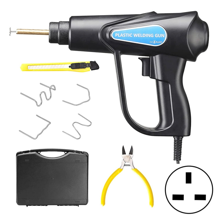 Black plastic welding gun with UK plug and assorted repair staples and clips