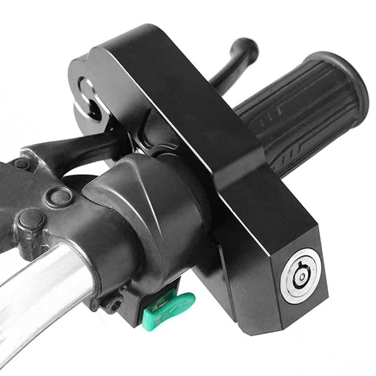 Motorcycle throttle handle lock, black, close-up on handlebar with key