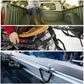 Black cargo hooks mounted on a truck bed rail and cargo setup for securing loads