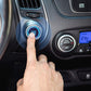 Engine Start button ignition switch being pressed on a car dashboard