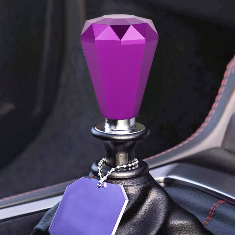Purple diamond-cut metal gear shift knob on chrome base with black boot