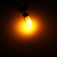 T5 car instrument panel LED bulb glowing warm yellow in dark area