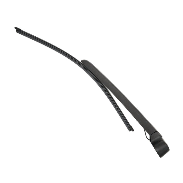 Rear wiper blade with frame, curved profile and mounting clip