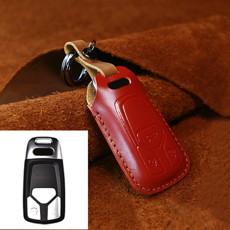 Red leather key fob protective cover with key ring, stitched edges, and button cutouts