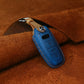 Blue leather key fob cover, stitched seams and embossed button icons with metal ring