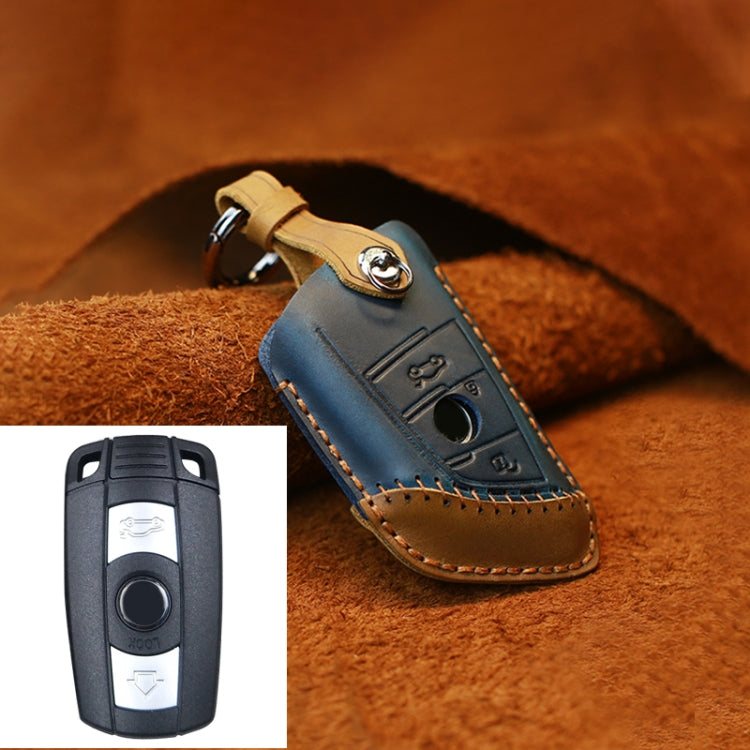 Blue leather key protective cover case with metal keyring and button cutout for two keys