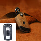 Brown leather key protective cover case with metal keyring and key button cutout