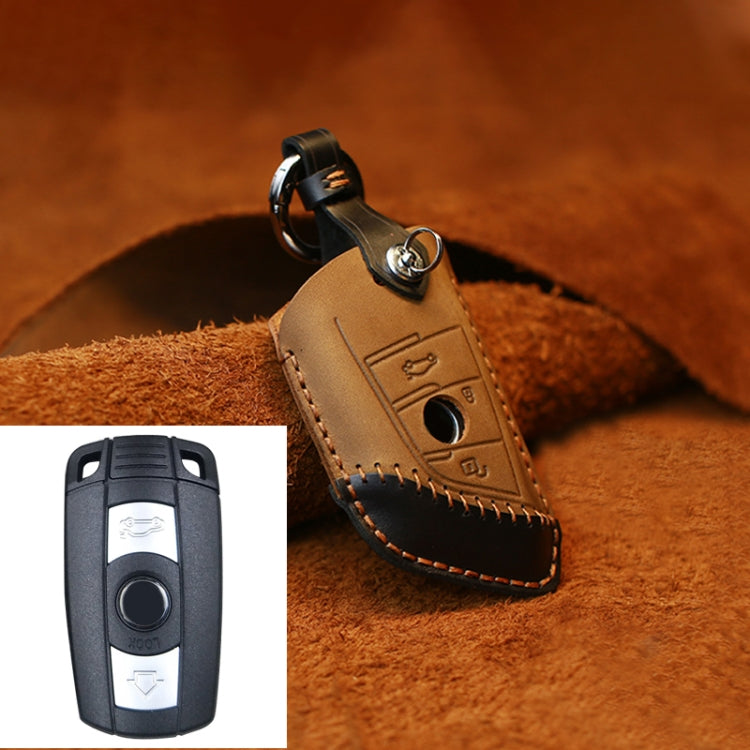 Brown leather key protective cover case with metal keyring and key button cutout