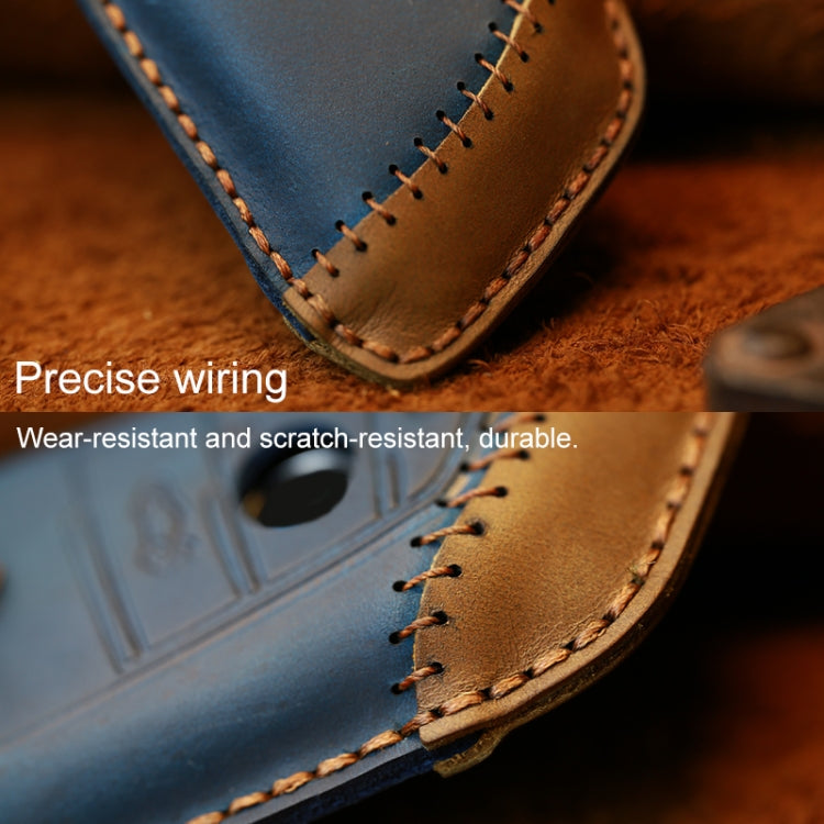 Blue leather key cover close-up with stitching and cutout for key fob button