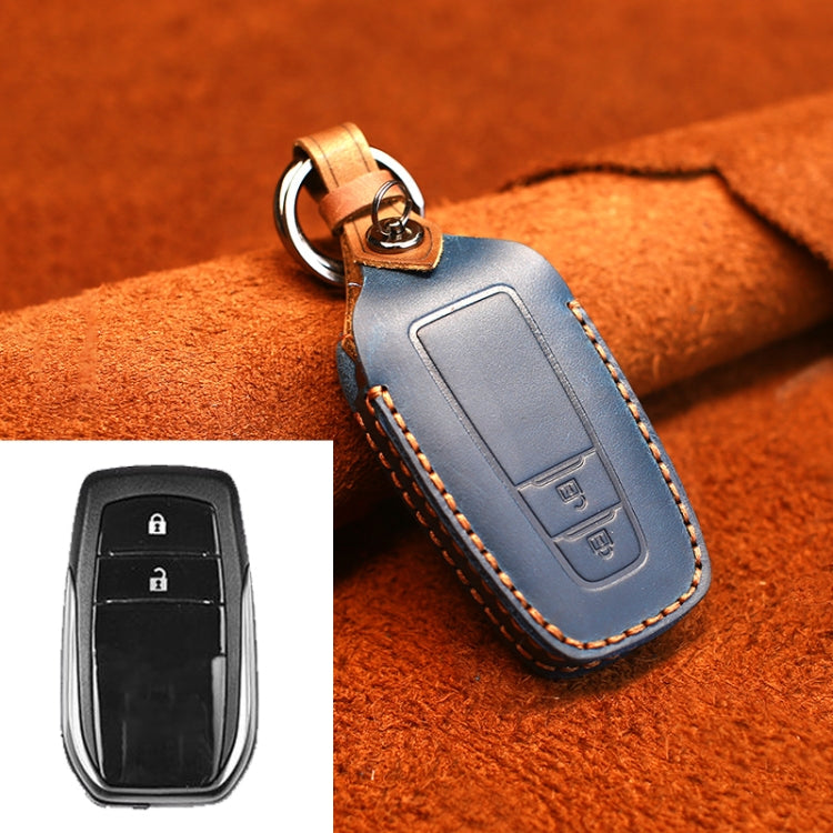 Leather key protective cover in dark blue with two-button panel, keyring loop.