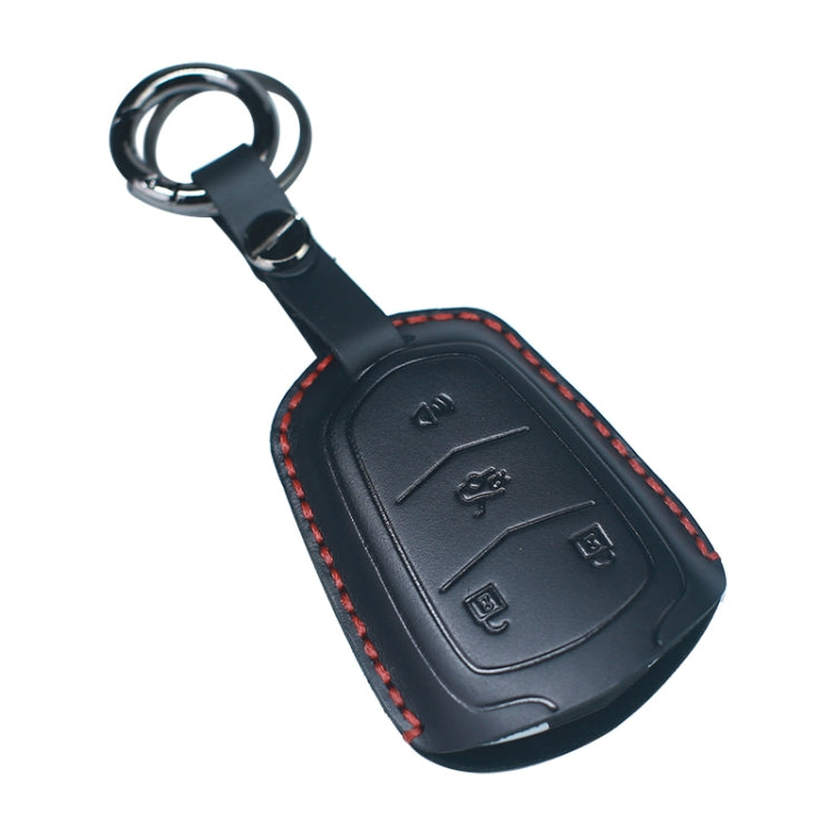 Black leather key fob cover with red-stitched edge and key ring loop