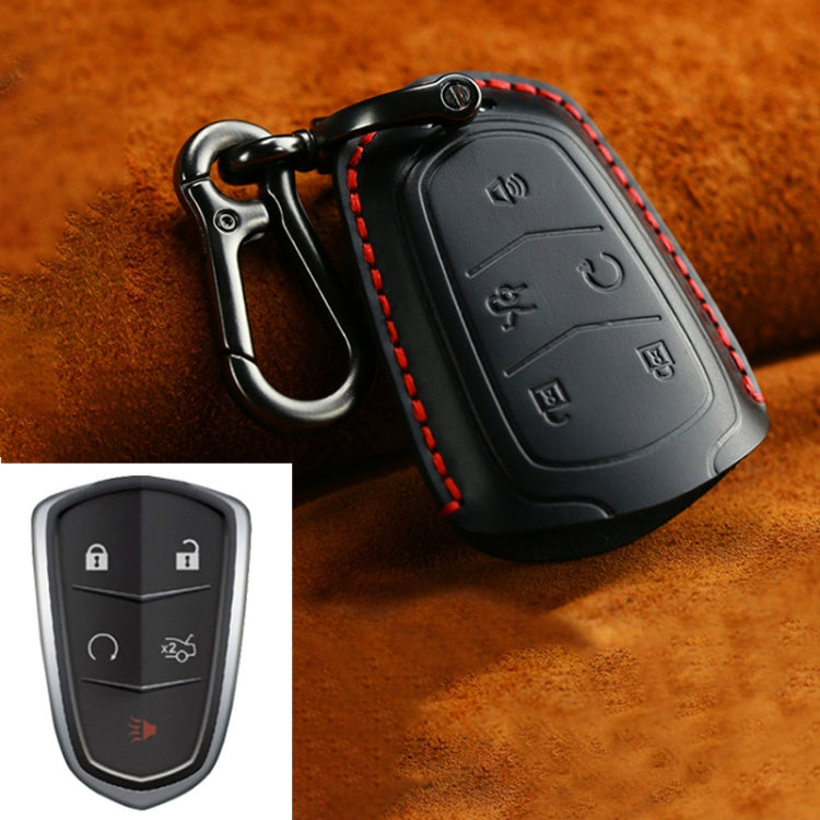 Black cowhide leather key fob cover with red stitching and metal carabiner clip