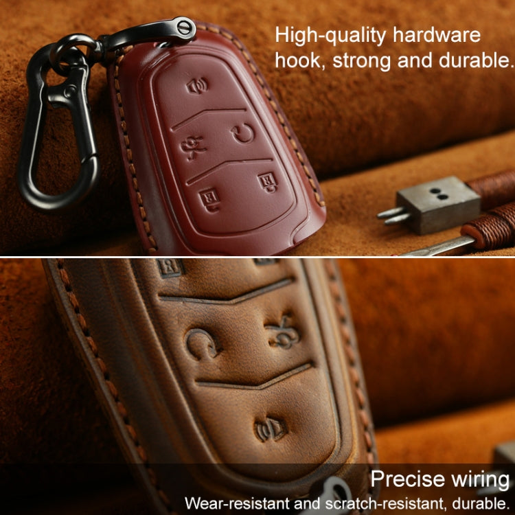 Red leather key fob cover with keychain hook, red stitching, carved button icons