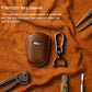 Brown leather key fob sleeve with Cadillac emblem and metal keychain hook