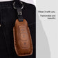Brown leather key fob cover with keyring, worn on a clip and stitched trim