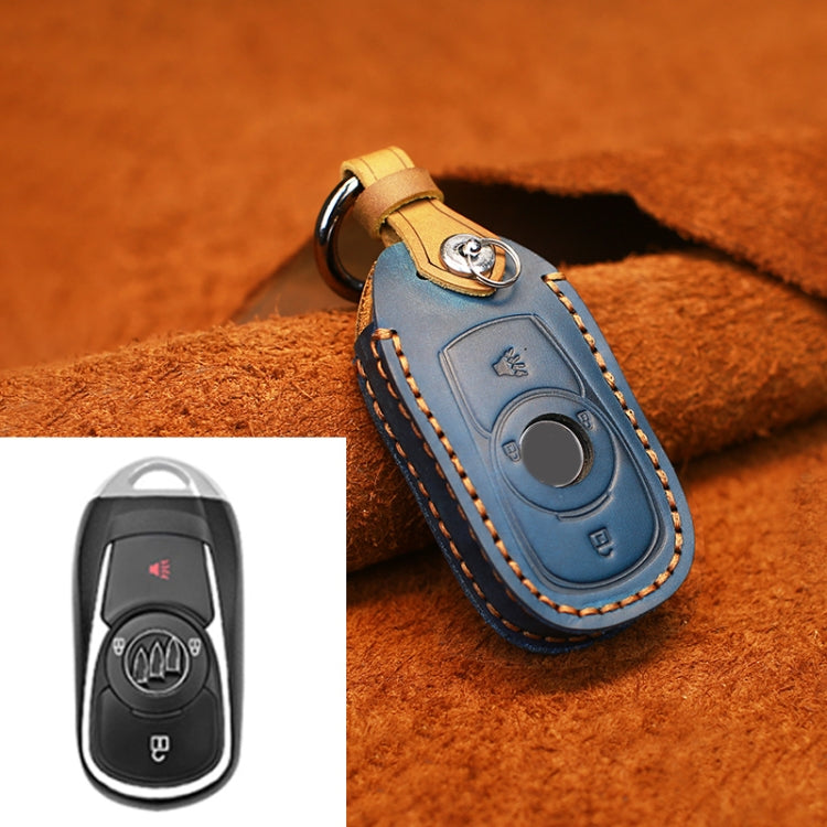 Blue leather key fob protective cover with tan strap and metal key ring