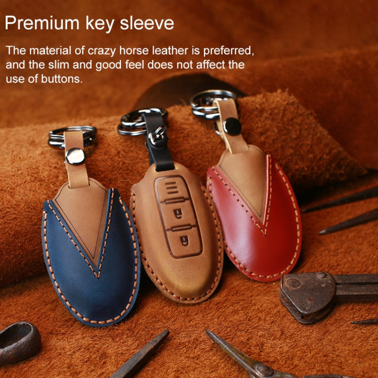 Nissan leather key protective cover set, blue, tan, and red with keyrings