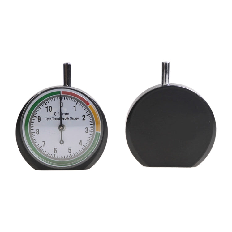 Tire tread depth gauge pointer dial front with green markings and black housing