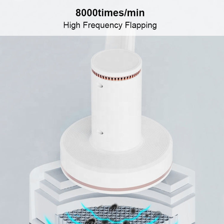 White handheld cordless vacuum with circular base and textured cleaning head