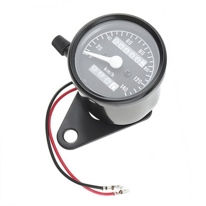 Black motorcycle speedometer odometer with mounting bracket and clear dial window