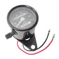 Black motorcycle speedometer odometer gauge with wiring and triangular mounting bracket