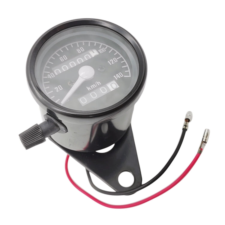 Black motorcycle speedometer odometer gauge with wiring and triangular mounting bracket