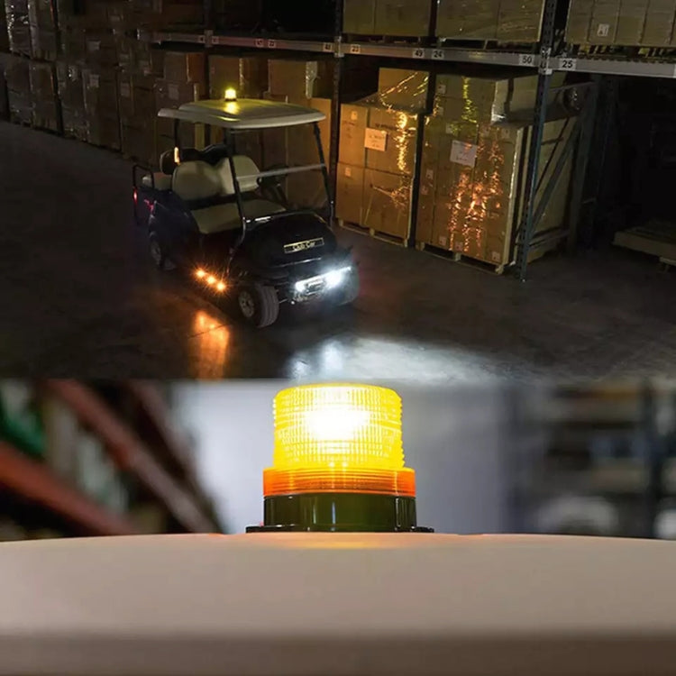 Yellow round solar warning light lit on a vehicle roof