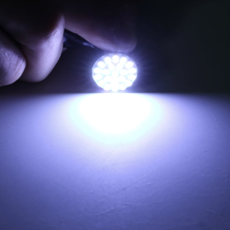 White LED 1156 turn signal bulb glowing with bright light output
