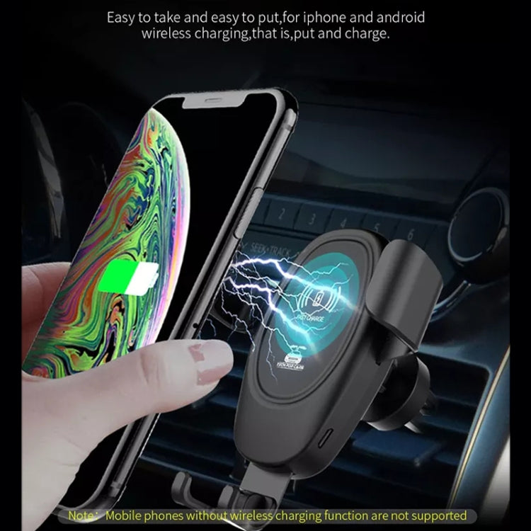 Black wireless car charger stand charging a smartphone with glowing charging icon