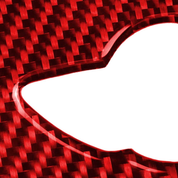 Close-up red carbon fiber steering wheel logo sticker with white logo opening