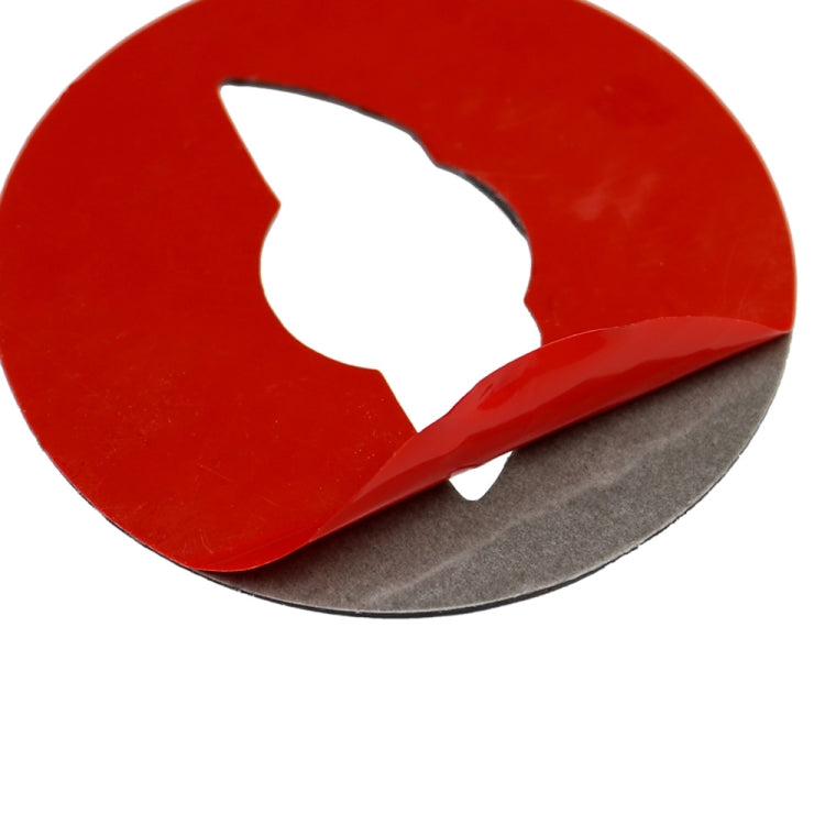 Red glossy carbon fiber steering wheel logo sticker with white silhouette and lifted edge