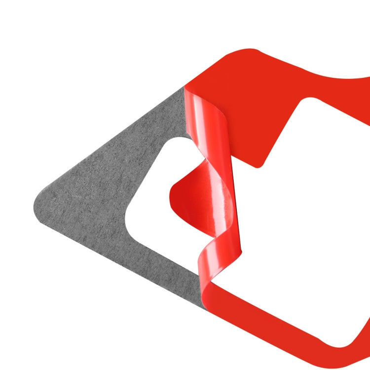Red-and-gray arrow-shaped backing template for gear trim sticker, glossy surface