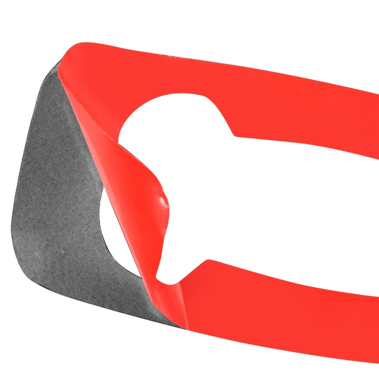 Window lift switch trim overlay with carbon-fiber patterned edge and red backing