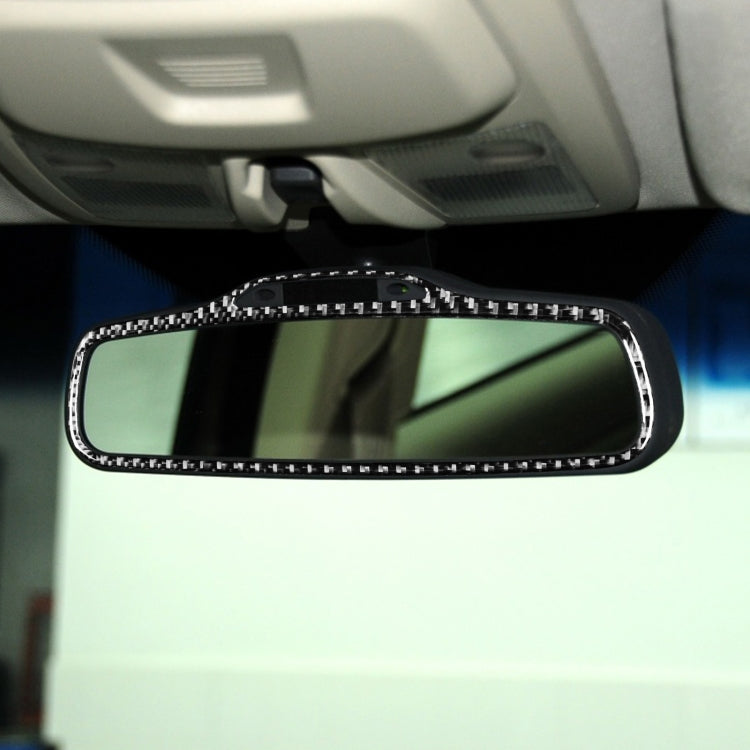 Installed black carbon fiber style rearview mirror trim sticker with curved frame