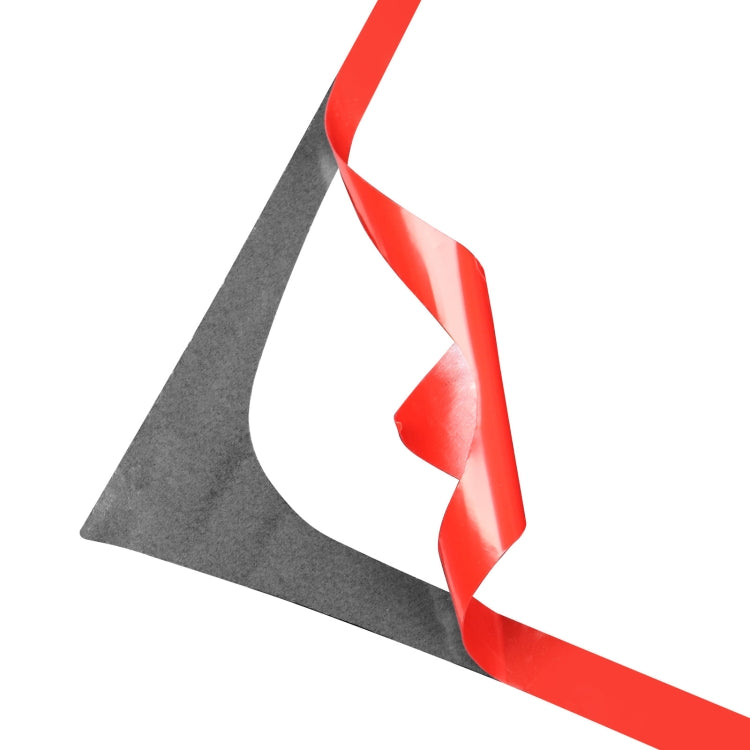 Carbon fiber trim piece with red backing edge and gray backing section