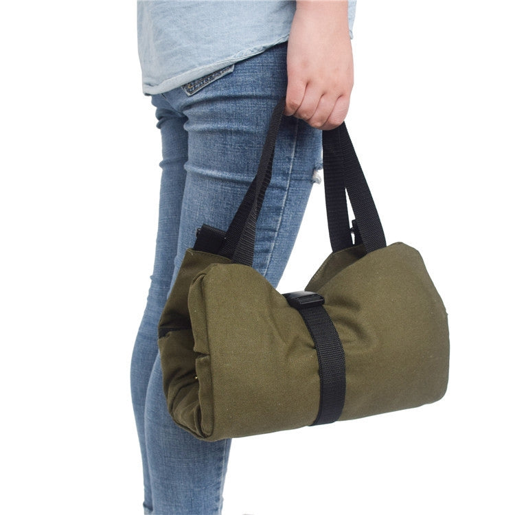 Army green canvas duffel-style tool bag with handles and zip pockets