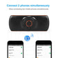 Black car Bluetooth speakerphone with orange-ring control showing dual-phone pairing