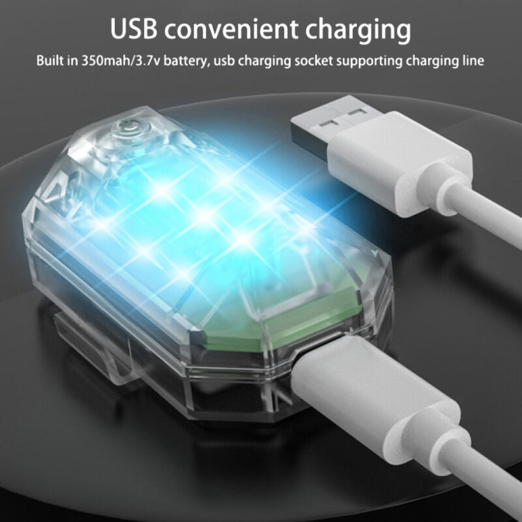 Motorcycle strobe light with USB charging cable connected to clear housing