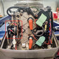 Marine outboard starter solenoid relay mounted in engine bay with visible wiring