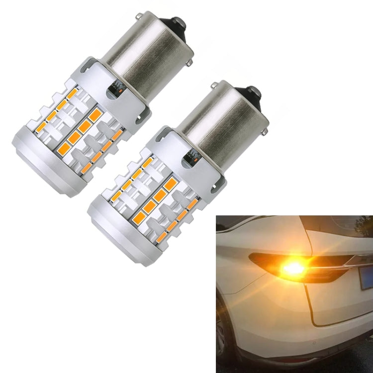 1156 LED turn signal bulb pair showing warm yellow light output