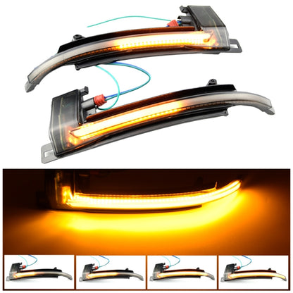 Pair of amber LED dynamic turn signal mirror lights with clear lens and black housing.