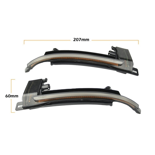 Pair of LED mirror turn signal light bars with smoked covers and mounting tabs, 207 mm.