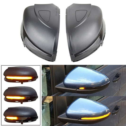 Pair of dark gray dynamic LED mirror turn signal covers with amber light strip